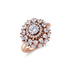 Rose gold ring with diamond accents on a white background