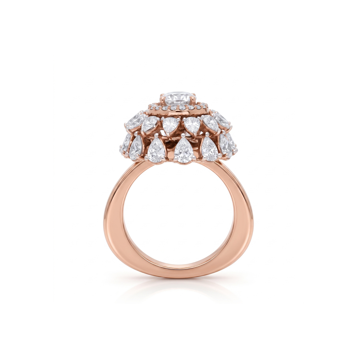 Rose gold ring with diamond teardrop design on a white background