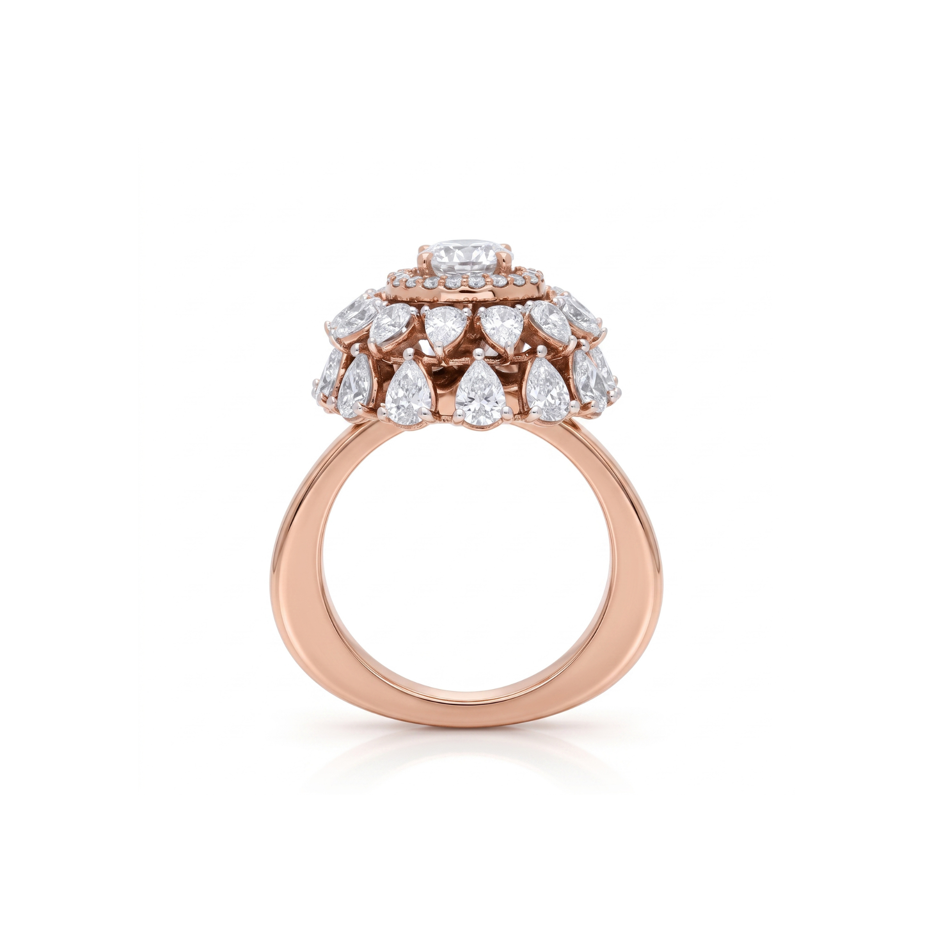 Rose gold ring with diamond teardrop design on a white background