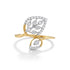 Gold and silver ring with leaf design on a white background