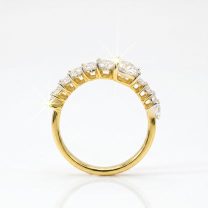 Gold ring with diamonds on a white background