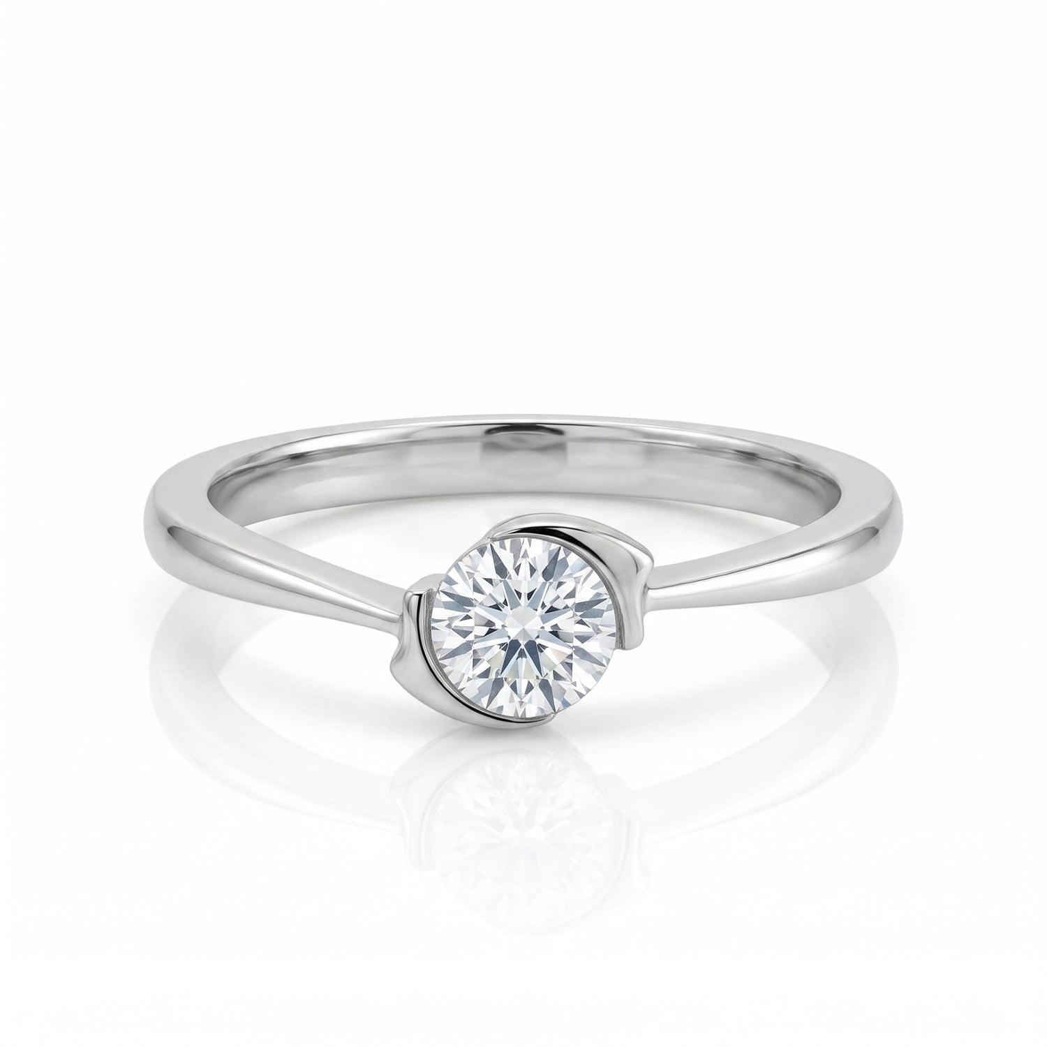 Silver ring with a diamond on a white background