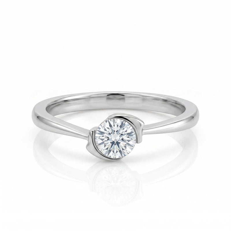 Silver ring with a diamond on a white background