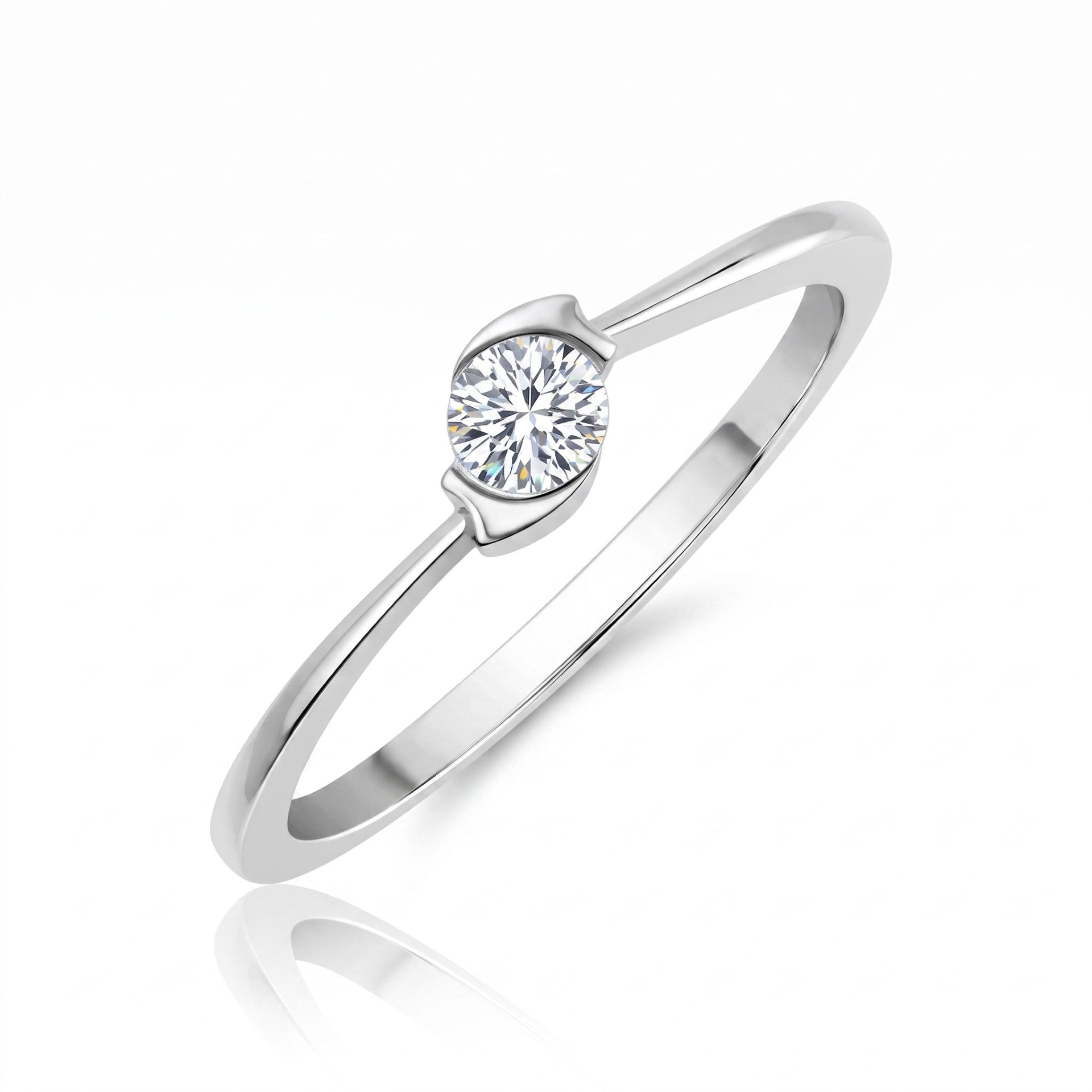 Silver ring with a diamond on a white background