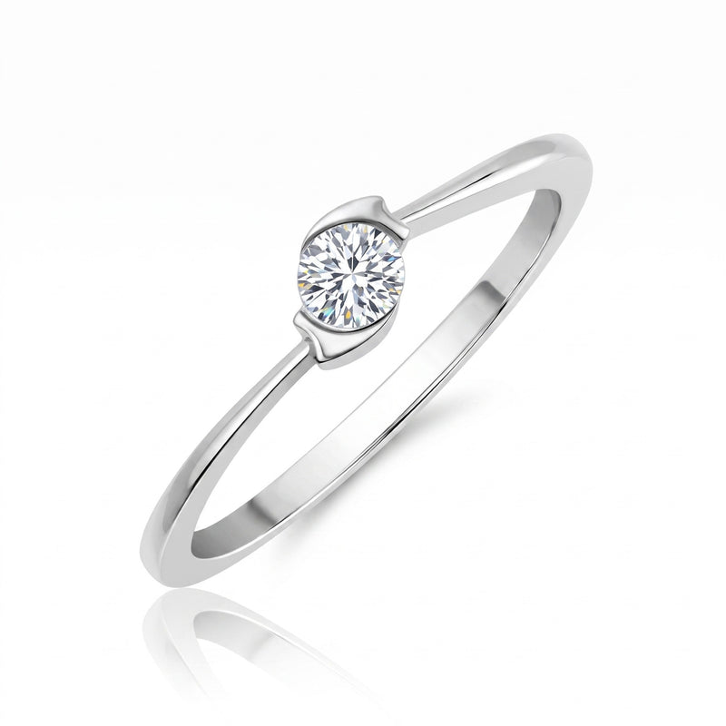 Silver ring with a diamond on a white background