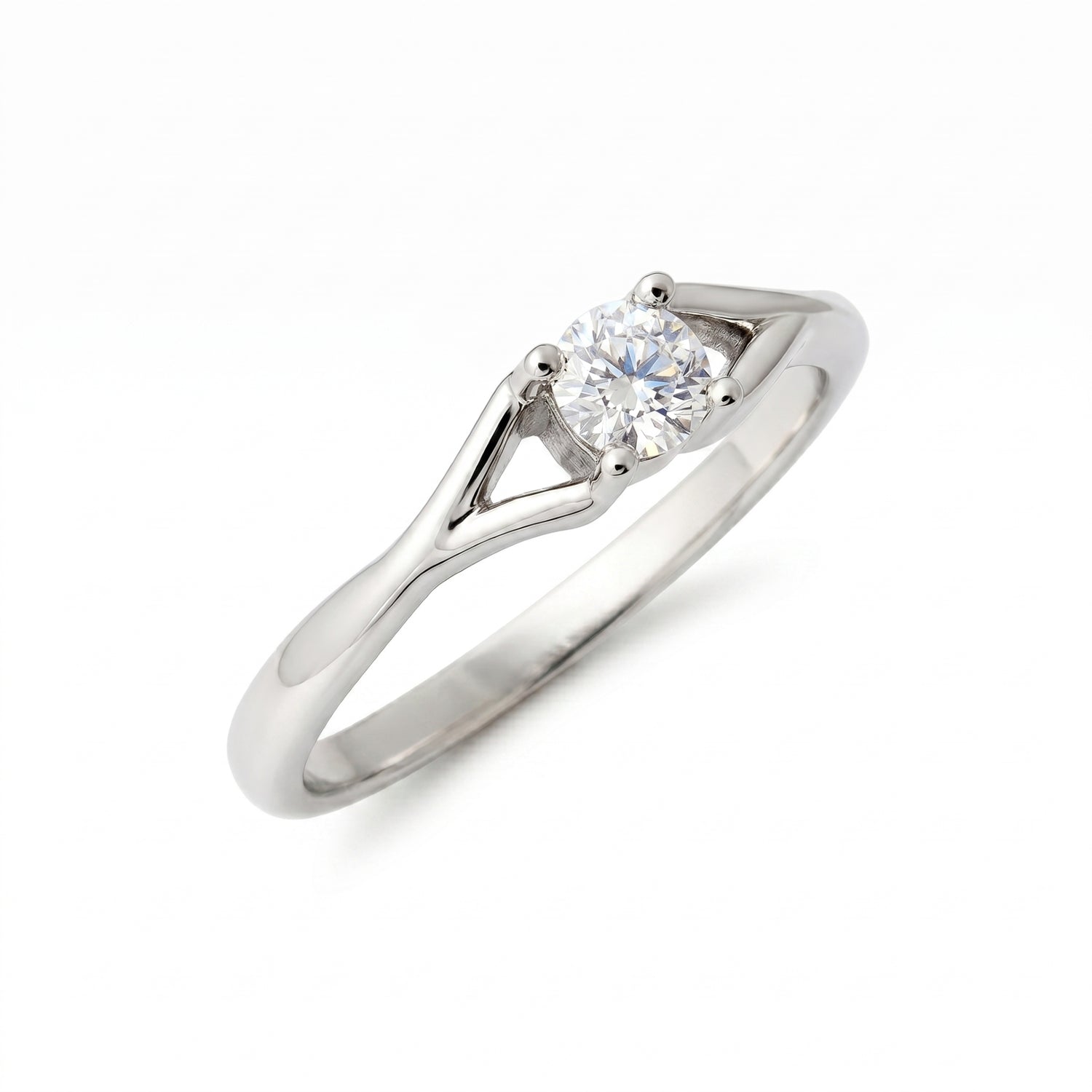 Elegant solitaire ring featuring a round lab-grown diamond on a white background.