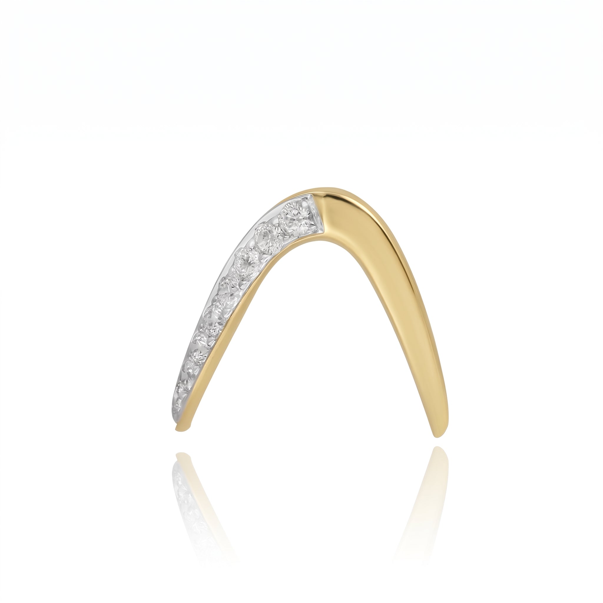 Gold ring with diamond accents on a white background