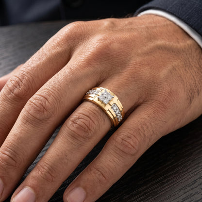 Close-up of a hand wearing a gold ring with diamonds on a dark surface