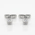 A pair of silver-toned cufflinks, each featuring an emerald-cut clear gemstone in a polished rectangular setting, displayed on a clean white reflective surface.