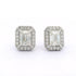 Pair of diamond earrings on a white background