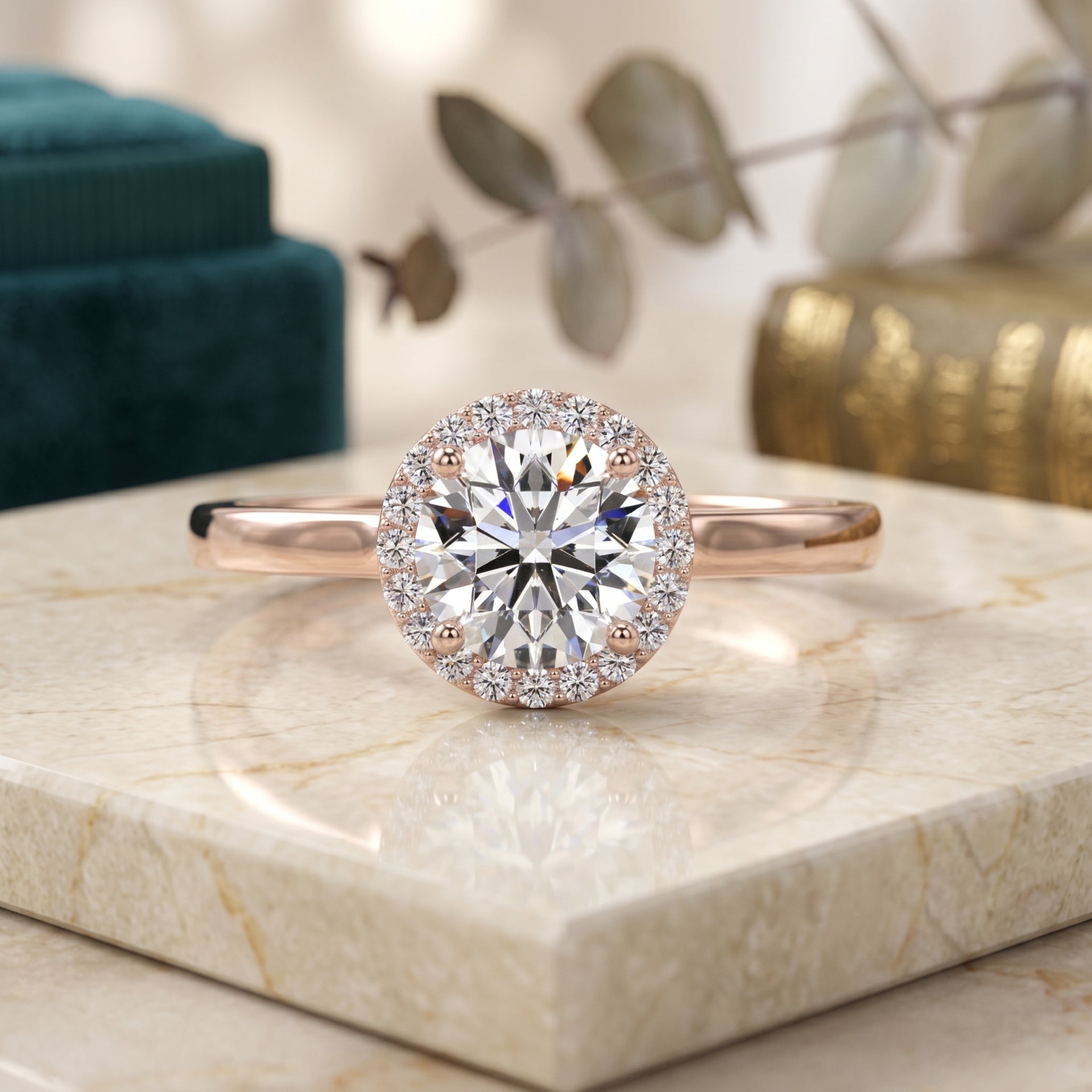 Rose gold diamond ring on a marble surface with a blurred decorative background