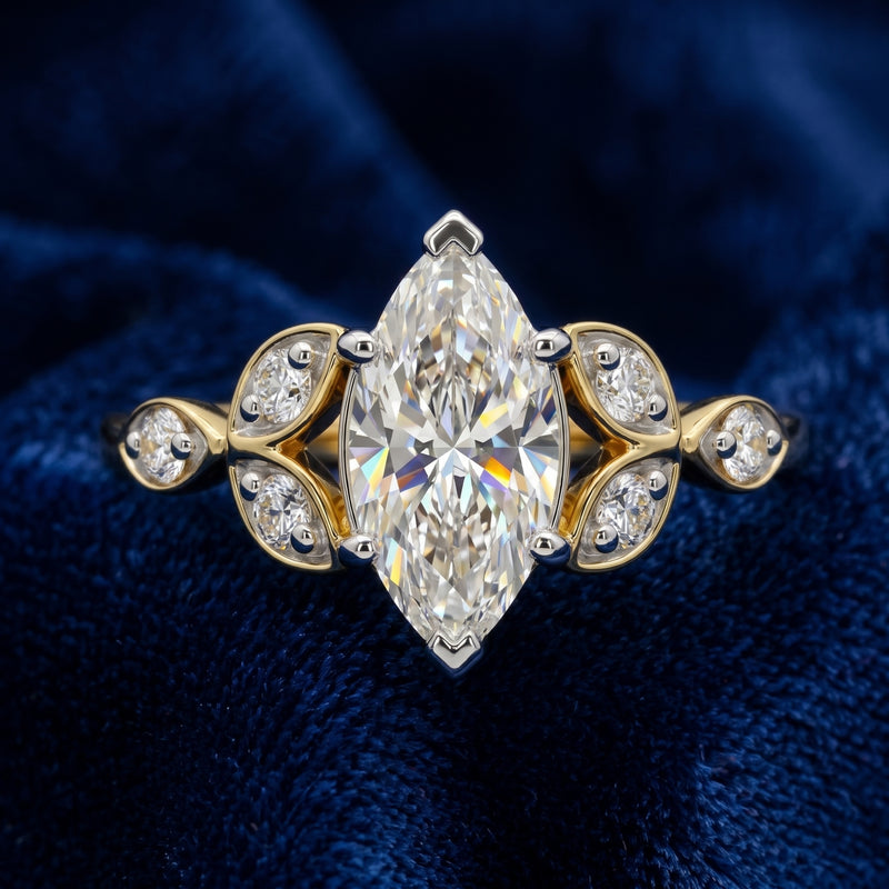 Gold and diamond ring on a blue textured background
