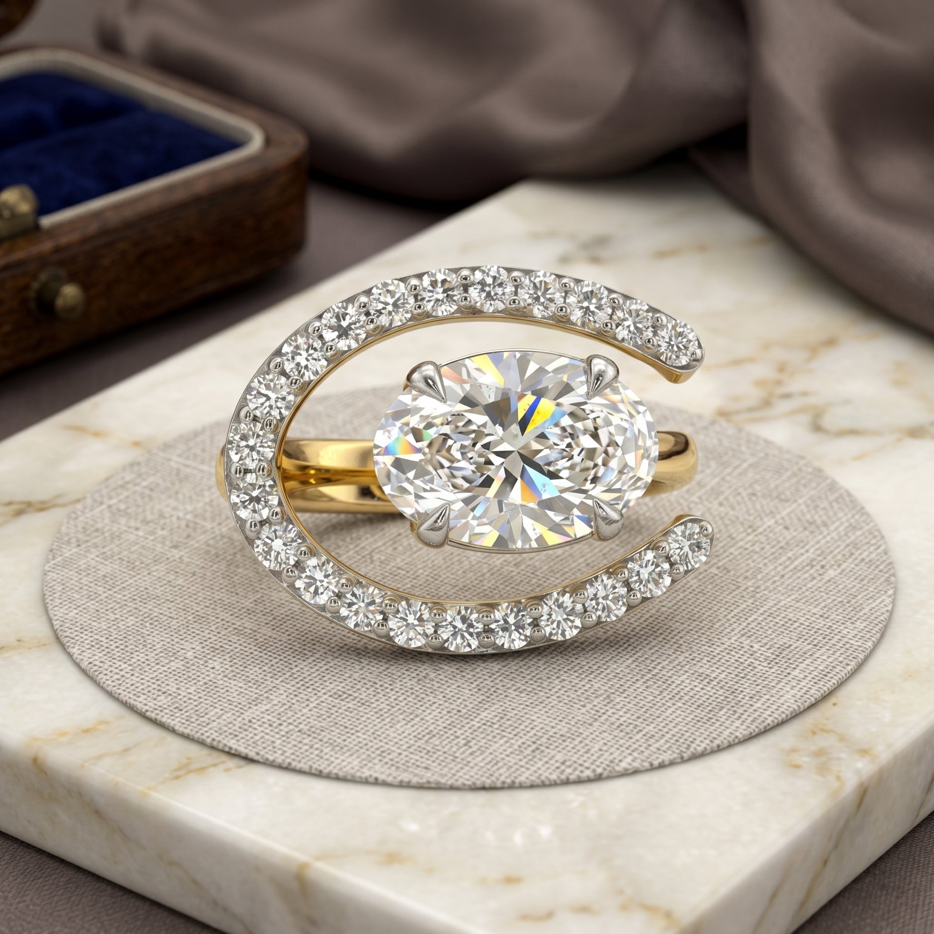 Gold ring with a large diamond on a marble surface