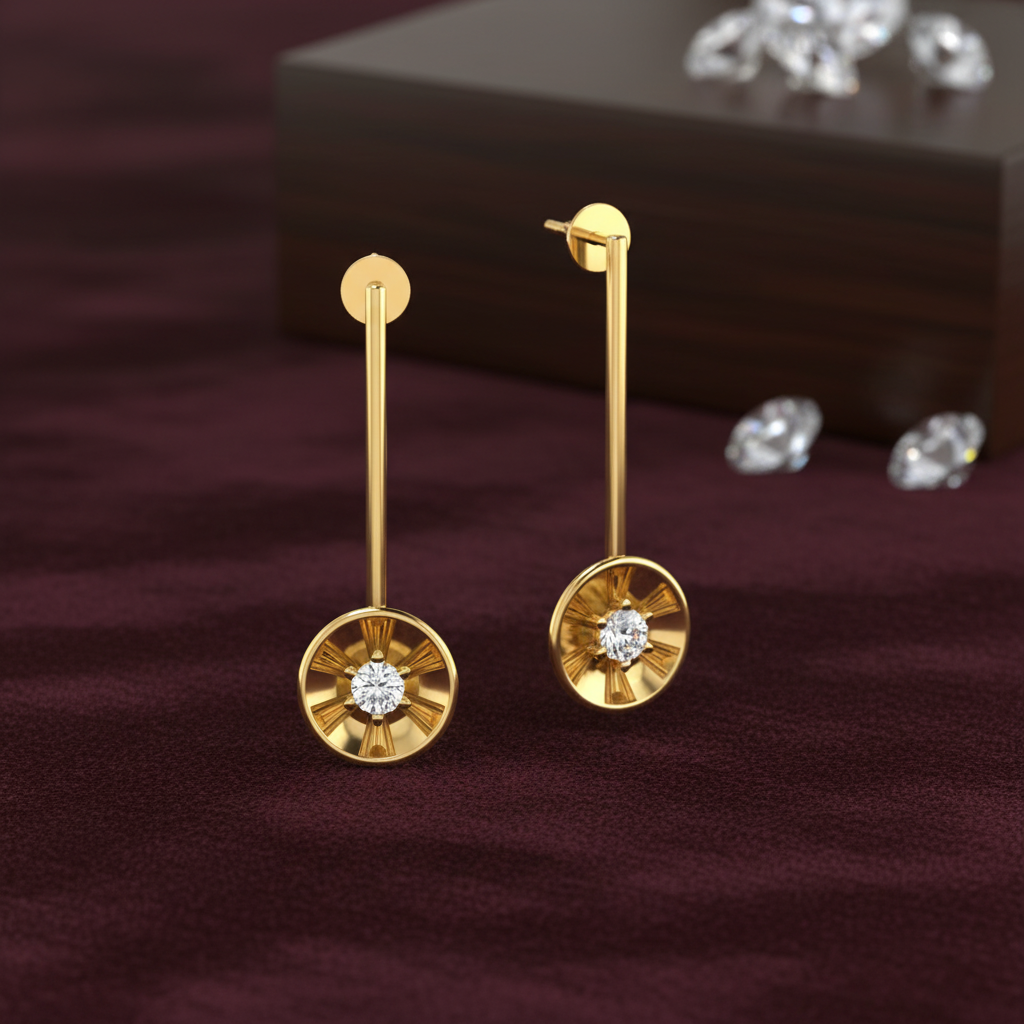 Gold earrings with diamond-like stones on a dark purple fabric background