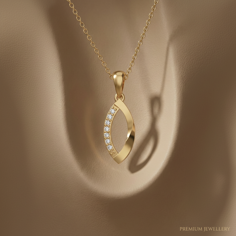 Gold necklace with a pendant on a brown background