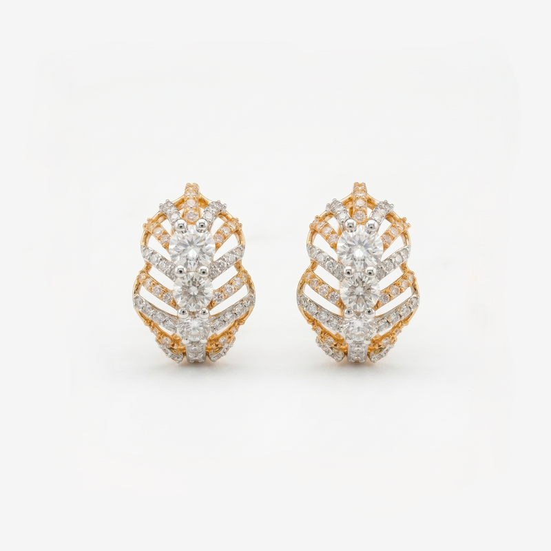 Geometric gold stud earrings featuring sparkling lab-grown diamonds on a white background.