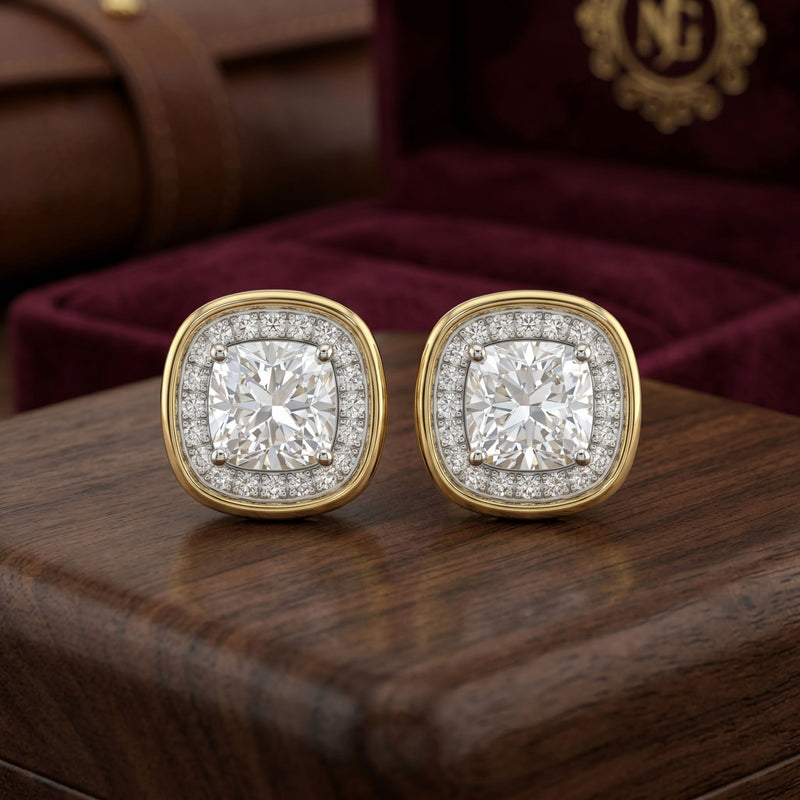 Square lab-grown diamond stud earrings with gold detailing on a dark display.