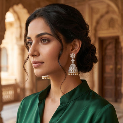 Woman wearing elegant geometric lab-grown diamond stud earrings in a lifestyle portrait.