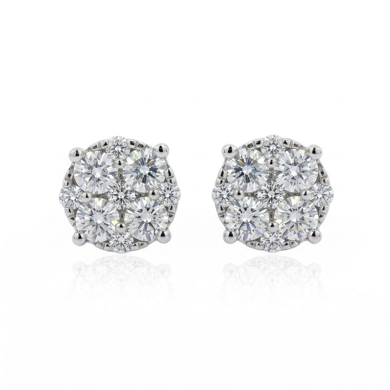 Pair of diamond stud earrings on a white background