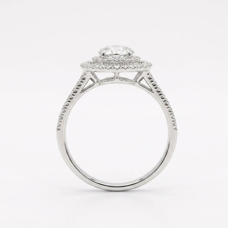 Silver ring with a diamond on a white background